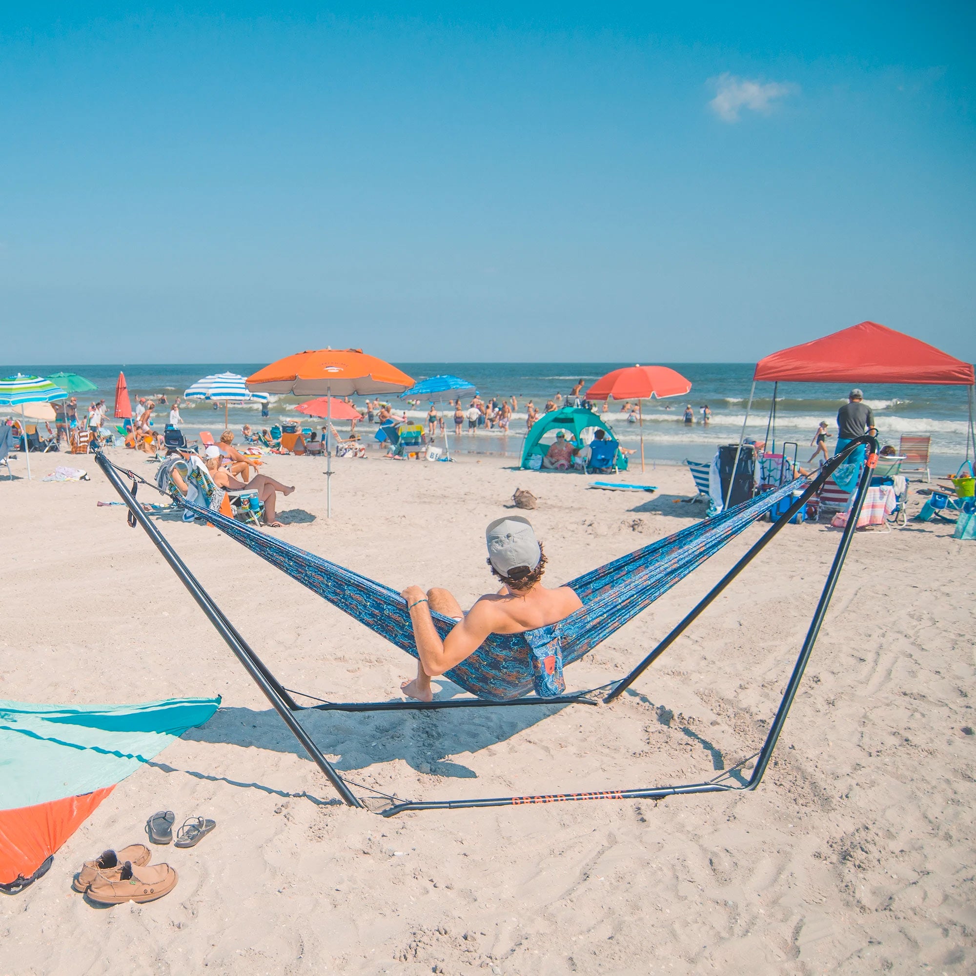 Chilling at the beach in the Grand Trunk Hammock Stand with sand