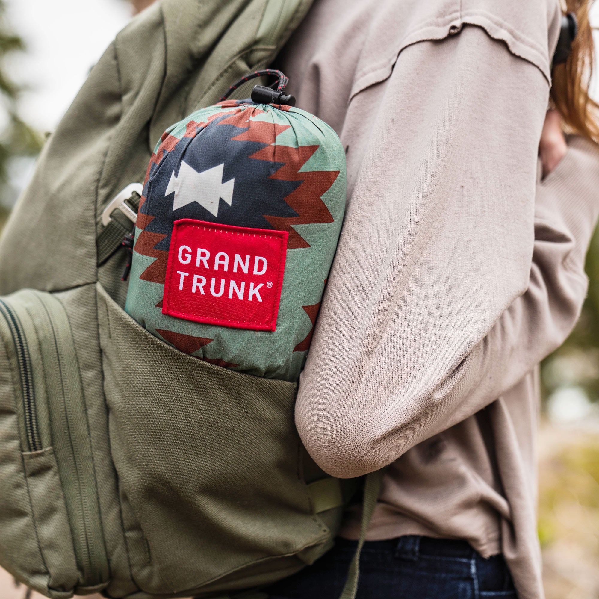 TrunkTech™ stuff sack inside a backpack waterbottle pocket vista print