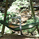 Mozzy bug net with woman inside hammock j-zipper
